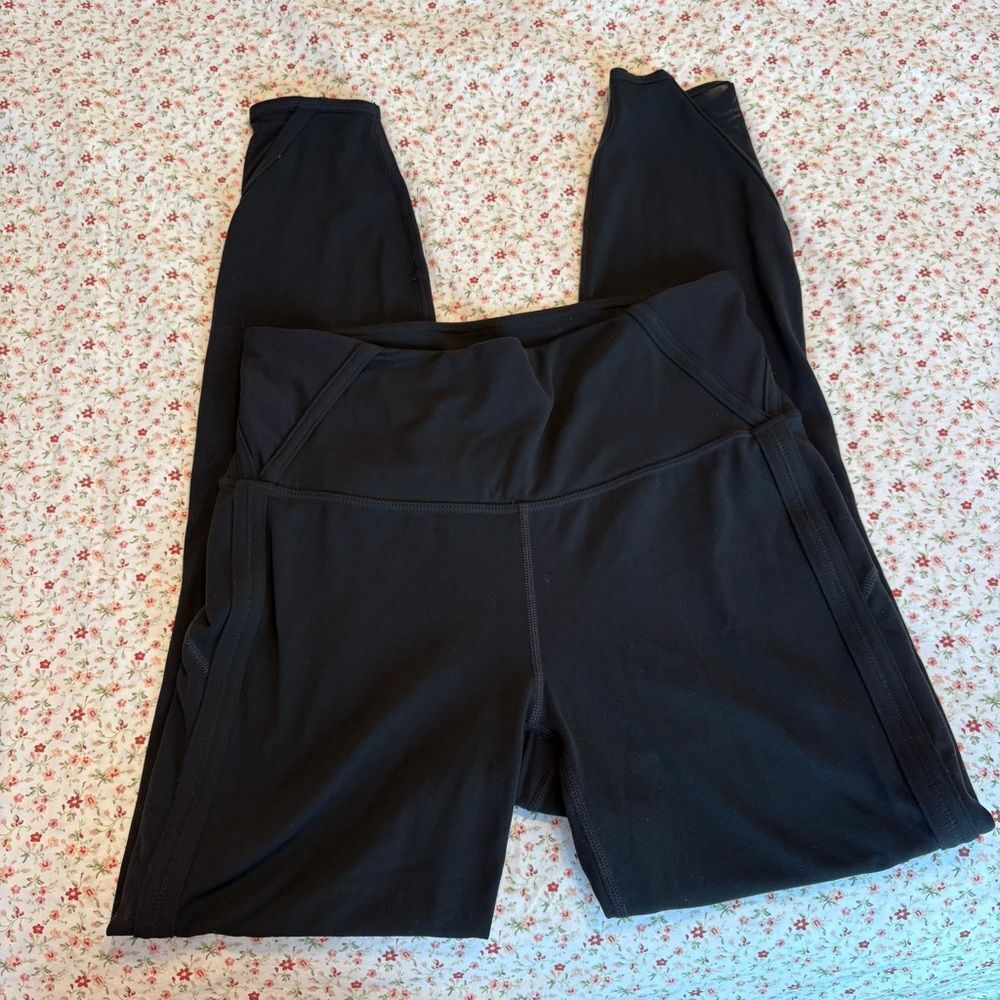 Athleta high waisted leggings with mesh detail and cut out detail on the side
